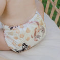 Load image into Gallery viewer, Baby wearing a Reusable Cloth Nappy – Palm Garden | 2.0 | My Little Gumnut, designed for comfort and everyday movement.