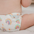 Load image into Gallery viewer, Baby wearing a Reusable Cloth Nappy – Pastel Medley | 2.0 | My Little Gumnut with a secure fit and soft bamboo lining.