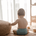 Load image into Gallery viewer, Baby wearing a Reusable Cloth Nappy – Blue | 2.0 | My Little Gumnut, designed for comfort and everyday movement.