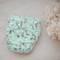 Load image into Gallery viewer, Reusable Cloth Nappy – Cockatoo | 2.0 | My Little Gumnut displayed flat to showcase the cockatoo-inspired print and adjustable snaps.