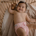 Load image into Gallery viewer, Baby wearing a Reusable Cloth Nappy – Pink | 2.0 | My Little Gumnut, designed for comfort and everyday movement.