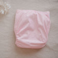 Load image into Gallery viewer, Reusable Cloth Nappy – Pink | 2.0 | My Little Gumnut folded flat to highlight the simple pink design detail.