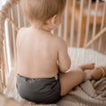 Load image into Gallery viewer, Baby wearing a Reusable Cloth Nappy – Grey | 2.0 | My Little Gumnut shown from behind to demonstrate fit and comfort.