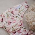 Load image into Gallery viewer, Reusable Cloth Nappy – Lily | 2.0 | My Little Gumnut folded flat to highlight the delicate floral print detail.