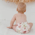 Load image into Gallery viewer, Baby wearing a Reusable Cloth Nappy – Lily | 2.0 | My Little Gumnut shown from behind to demonstrate fit and comfort.