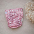 Load image into Gallery viewer, Reusable Cloth Nappy – Monstera Pink | 2.0 | My Little Gumnut displayed flat to showcase the pink botanical print and adjustable snaps.