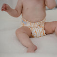 Load image into Gallery viewer, Baby wearing a Reusable Cloth Nappy – Sandy Blaze | 2.0 | My Little Gumnut, designed for comfort and everyday movement.
