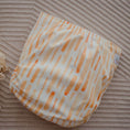 Load image into Gallery viewer, Reusable Cloth Nappy – Sandy Blaze | 2.0 | My Little Gumnut folded flat to highlight the soft patterned design detail.