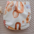 Load image into Gallery viewer, Reusable Newborn Cloth Nappy featuring a neutral-inspired design with artistic patterns from My Little Gumnut.
