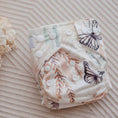 Load image into Gallery viewer, Reusable Newborn Cloth Nappy - Palm Garden design featuring tropical flora and butterflies, soft fabric for newborns.