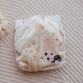 Load image into Gallery viewer, Reusable Newborn Cloth Nappy featuring a tropical botanical design in soft pastel colors.