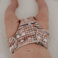 Load image into Gallery viewer, Reusable Newborn Cloth Nappy in a plaid design, showcasing a stylish and eco-friendly choice for babies.
