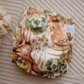 Load image into Gallery viewer, Reusable Newborn Cloth Nappy featuring a unique dinosaur design in vibrant colors for eco-friendly parenting.