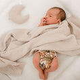 Load image into Gallery viewer, Newborn using a Reusable Newborn Cloth Nappy, wrapped in a soft blanket, peacefully resting.