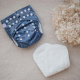 Load image into Gallery viewer, Reusable Cloth Nappy – Monstera Blue | 2.0 | My Little Gumnut displayed with insert to highlight absorbency and bamboo lining.