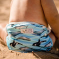 Load image into Gallery viewer, Reusable Swim Nappy featuring whale designs, ideal for beach days and pool play, by My Little Gumnut.