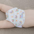 Load image into Gallery viewer, Reusable Swim Nappy in pastel rainbow design on a child, perfect for pool and beach days.