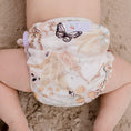 Load image into Gallery viewer, Reusable Swim Nappy featuring a playful design from My Little Gumnut on a sandy background.