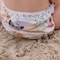 Load image into Gallery viewer, Reusable Swim Nappy - Palm Garden design by My Little Gumnut on a child playing in the sand.