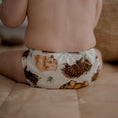 Load image into Gallery viewer, Baby wearing a Reusable Cloth Nappy – Aussie Animals | 2.0 | My Little Gumnut with adjustable fit and soft bamboo lining.