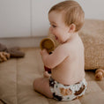 Load image into Gallery viewer, Baby wearing a Reusable Cloth Nappy – Aussie Animals | 2.0 | My Little Gumnut designed for comfort and everyday use.
