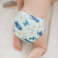 Load image into Gallery viewer, Baby wearing a Reusable Cloth Nappy – Marine Life | 2.0 | My Little Gumnut with a secure fit and soft bamboo lining.