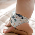 Load image into Gallery viewer, Baby wearing a Reusable Cloth Nappy – Marine Life | 2.0 | My Little Gumnut shown from behind to demonstrate fit and comfort.