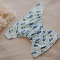 Load image into Gallery viewer, Reusable Cloth Nappy – Marine Life | 2.0 | My Little Gumnut folded flat to showcase the ocean-inspired print and adjustable fit.
