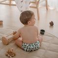 Load image into Gallery viewer, Baby wearing a Reusable Cloth Nappy – Cacti | 2.0 | My Little Gumnut shown from behind to highlight fit and comfort.