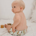 Load image into Gallery viewer, Baby wearing a Reusable Cloth Nappy – Banksia | 2.0 | My Little Gumnut, designed for comfort and everyday movement.