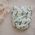 Load image into Gallery viewer, Reusable Cloth Nappy – Banksia | 2.0 | My Little Gumnut displayed flat to showcase the botanical print and adjustable snaps.