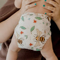 Load image into Gallery viewer, Reusable cloth nappy in our Bees print with double gussets, adjustable sizing and soft bamboo lining for everyday comfort and leak protection.