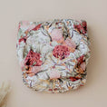 Load image into Gallery viewer, Reusable Cloth Nappy – Blush Botanical | 2.0 | My Little Gumnut folded flat to highlight the botanical print detail.