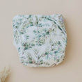 Load image into Gallery viewer, Reusable Cloth Nappy – Eucalyptus Green | 2.0 | My Little Gumnut folded flat to highlight the eucalyptus-inspired print detail.