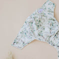 Load image into Gallery viewer, Baby wearing a Reusable Cloth Nappy – Eucalyptus Green | 2.0 | My Little Gumnut with a secure fit and soft bamboo lining.