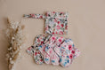 Load image into Gallery viewer, Mini wet bags for storing reusable menstrual pads or reusable breast pads. menstrual pad bag. cloth menstrual pad bag. mini floral wet bag by my little gumnut. 5 floral menstrual pads with mini wet bag