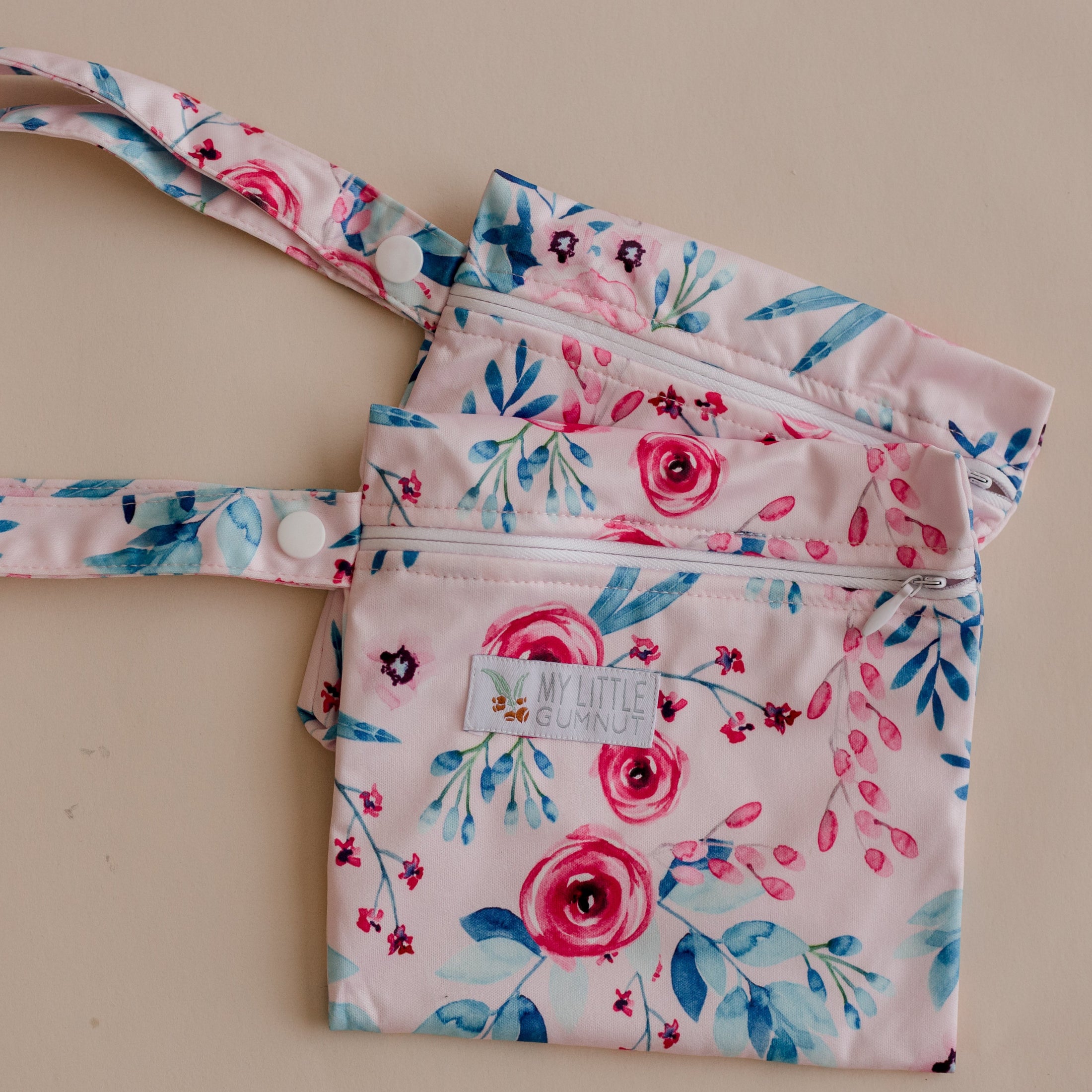 Mini wet bags for storing reusable menstrual pads or reusable breast pads. menstrual pad bag. cloth menstrual pad bag. mini floral wet bag by my little gumnut.