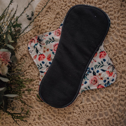 Reusable Menstrual Pads by My Little Gumnut. Cloth pads Australia. Period pads. Floral mentrual pad with bamboo charcoal inner layer.