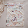 Load image into Gallery viewer, Reusable Wet Bag – Palm Garden design for cloth nappies, swimwear and daycare essentials