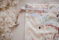 Load image into Gallery viewer, Palm Garden reusable wet bag by My Little Gumnut with secure zip closure