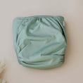 Load image into Gallery viewer, Reusable Cloth Nappy – Sage | 2.0 | My Little Gumnut folded flat to highlight the earthy sage design detail.