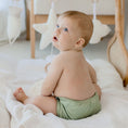 Load image into Gallery viewer, Baby wearing a Reusable Cloth Nappy – Sage | 2.0 | My Little Gumnut, designed for comfort and everyday movement.