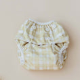 Load image into Gallery viewer, Reusable Swim Nappy in Gingham (Beige) design, perfect for beach days and pool play.