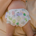 Load image into Gallery viewer, Reusable Swim Nappy - Pineapples design by My Little Gumnut on a child's bottom for eco-friendly swimming.
