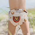 Load image into Gallery viewer, Reusable Swim Nappy in Rainbow Earth Tones design, perfect for beach days and pool play.