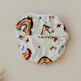 Load image into Gallery viewer, Reusable Swim Nappy - Rainbow (Earth Tones) with colorful patterns, perfect for beach days and pool play.