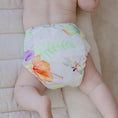 Load image into Gallery viewer, Baby wearing a Reusable Cloth Nappy – Tropical Garden | 2.0 | My Little Gumnut shown from behind to demonstrate fit and comfort.