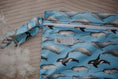 Load image into Gallery viewer, Whales reusable wet bag laid flat showing ocean-inspired whale design