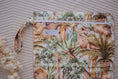 Load image into Gallery viewer, Dino Land reusable wet bag by My Little Gumnut with secure zip closure