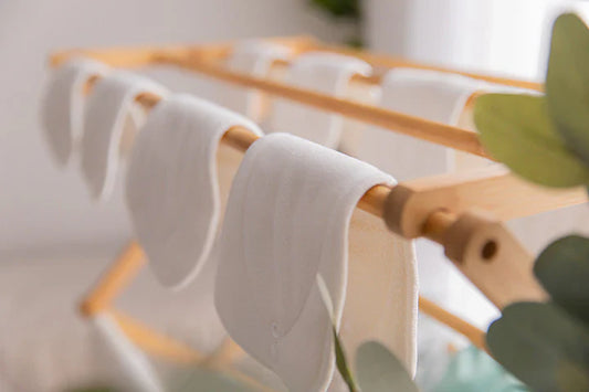 My Little Gumnut Nappy Inserts drying on a clothes rack